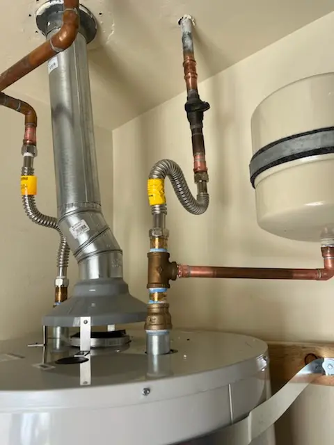 Water heater installation and plumbing repair in Forbes Village